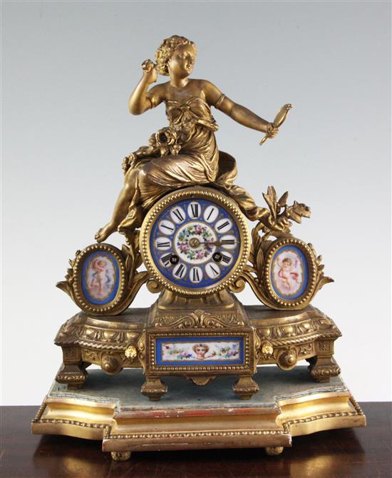 A 19th century French ormolu and Sevres style porcelain mantel clock, 12in.